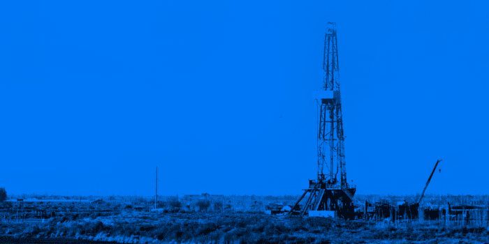Oilfield with blue background.