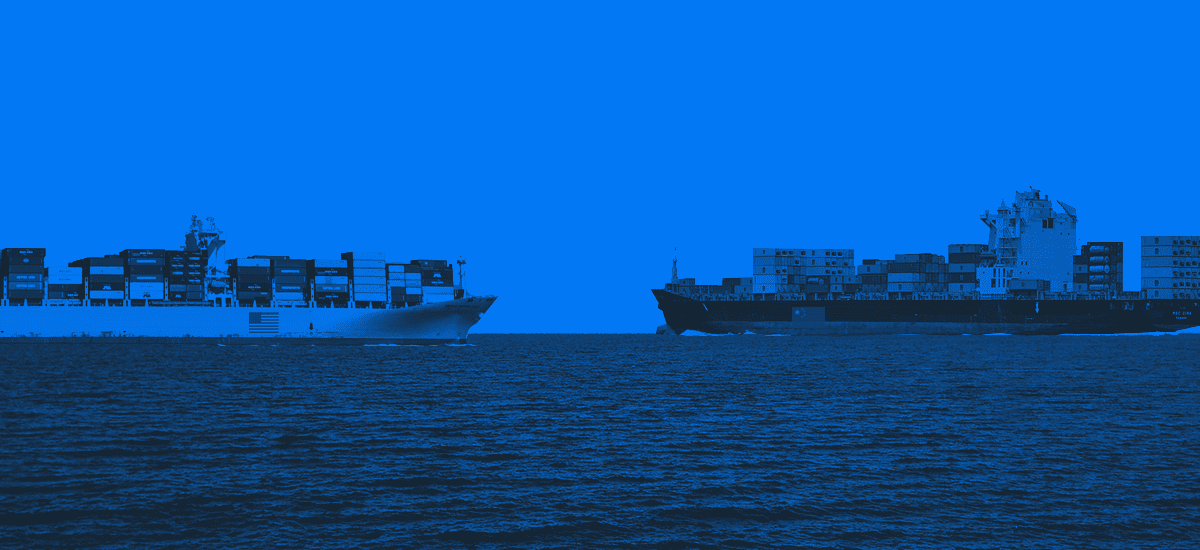Two cargo ships on blue background.