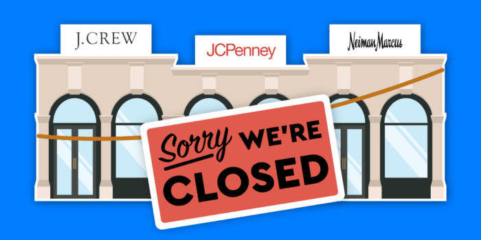 "Sorry We're Closed" sign in front of retail stores.
