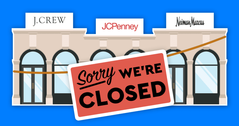 "Sorry We're Closed" sign in front of retail stores.